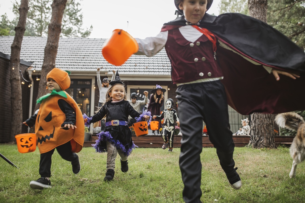 Young kids trick or treating during Halloween.