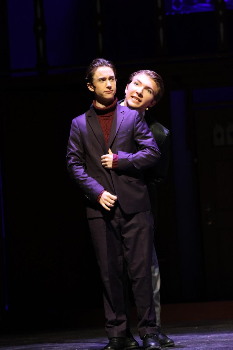 Weston Potten (Wadsworth) gets personal with Finn Pryor (Professor Plum).