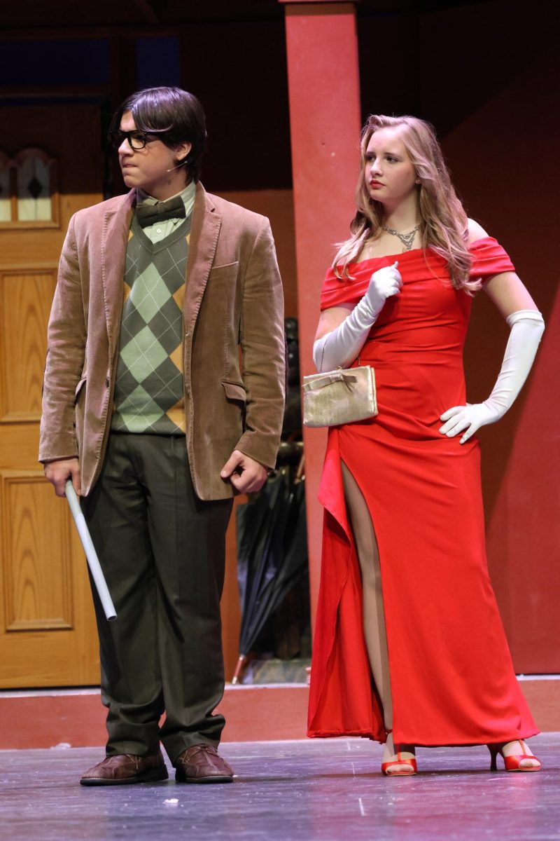 AJ Boyle (Mr. Green) and Daisy Huller (Miss. Scarlett) acting awfully suspicious.