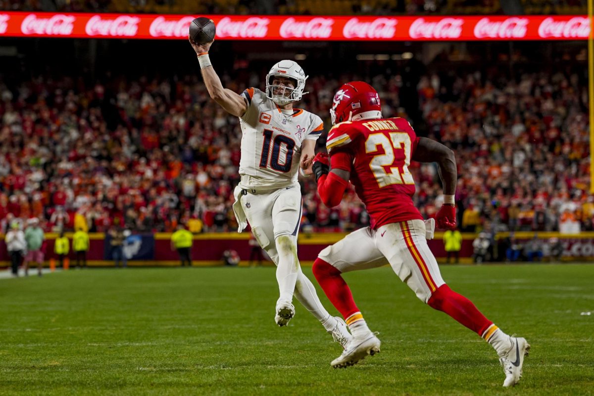 Dec 25, 2025; Kansas City, Missouri, USA; Denver Broncos quarterback Bo Nix (10) throws a toucdown pass during the fourth quarter at GEHA Field at Arrowhead Stadium. Mandatory Credit: Jay Biggerstaff-Imagn Images