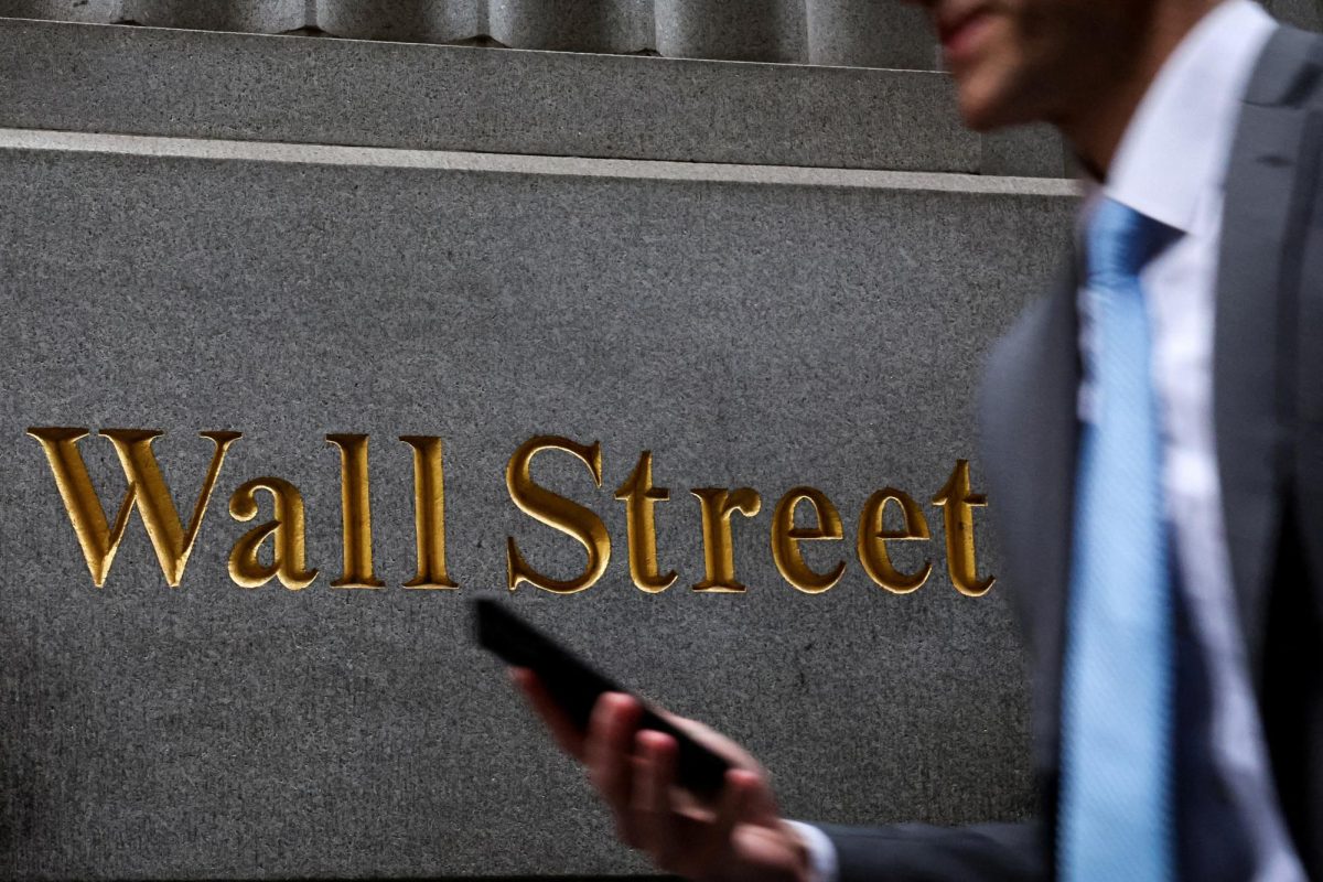A man walks on Wall Street outside the New York Stock Exchange (NYSE) in New York City, U.S., April 7, 2025. REUTERS/Brendan McDermid