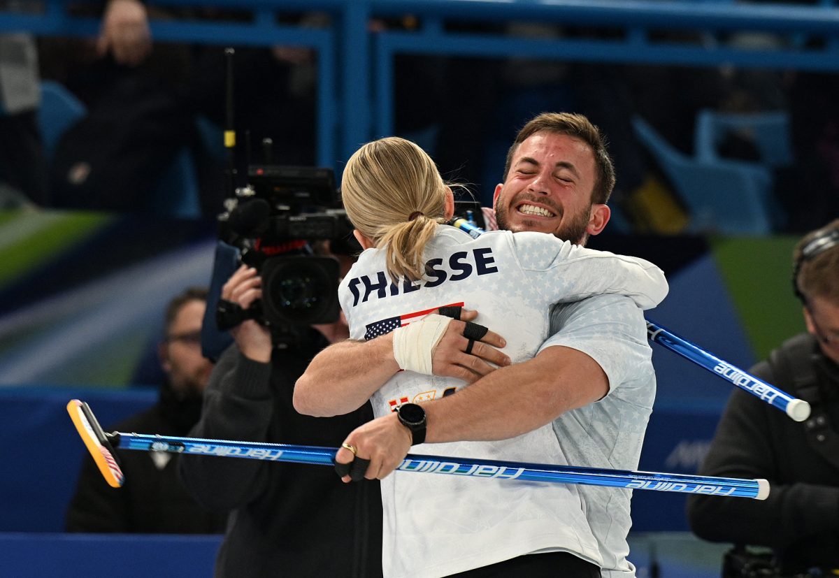 Milano Cortina 2026 Olympics - Curling - Mixed Doubles Semi-final - Italy vs United States of America - Cortina Curling Olympic Stadium, Cortina d'Ampezzo, Italy - February 09, 2026. Korey Dropkin of United States and Cory Thiesse of United States celebrate winning against Amos Mosaner of Italy and Stefania Constantini of Italy REUTERS/Jennifer Lorenzini